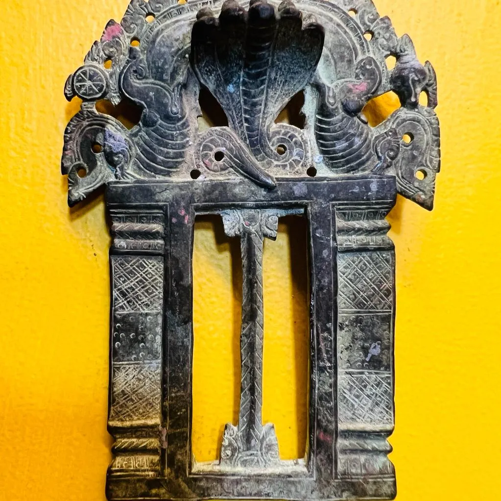 Pital 20  : Vintage Style Brass Prabhawali with a Naga Detailing